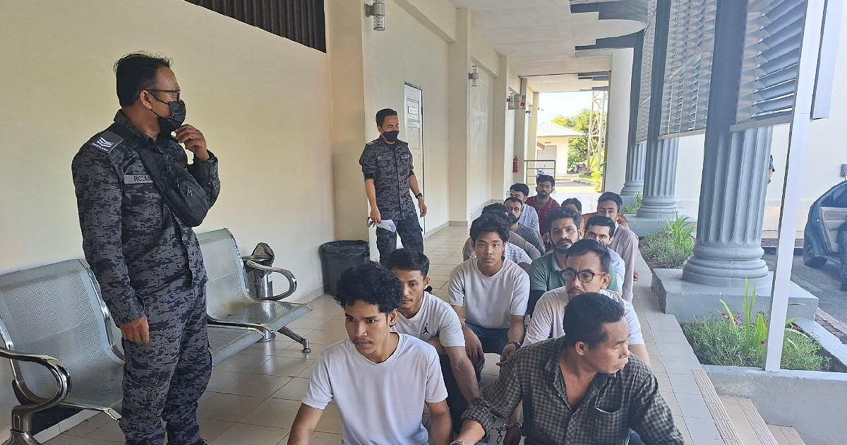 Fourteen Foreign Nationals Face Court Charges Over Illegal Entry and Overstaying in Malaysia