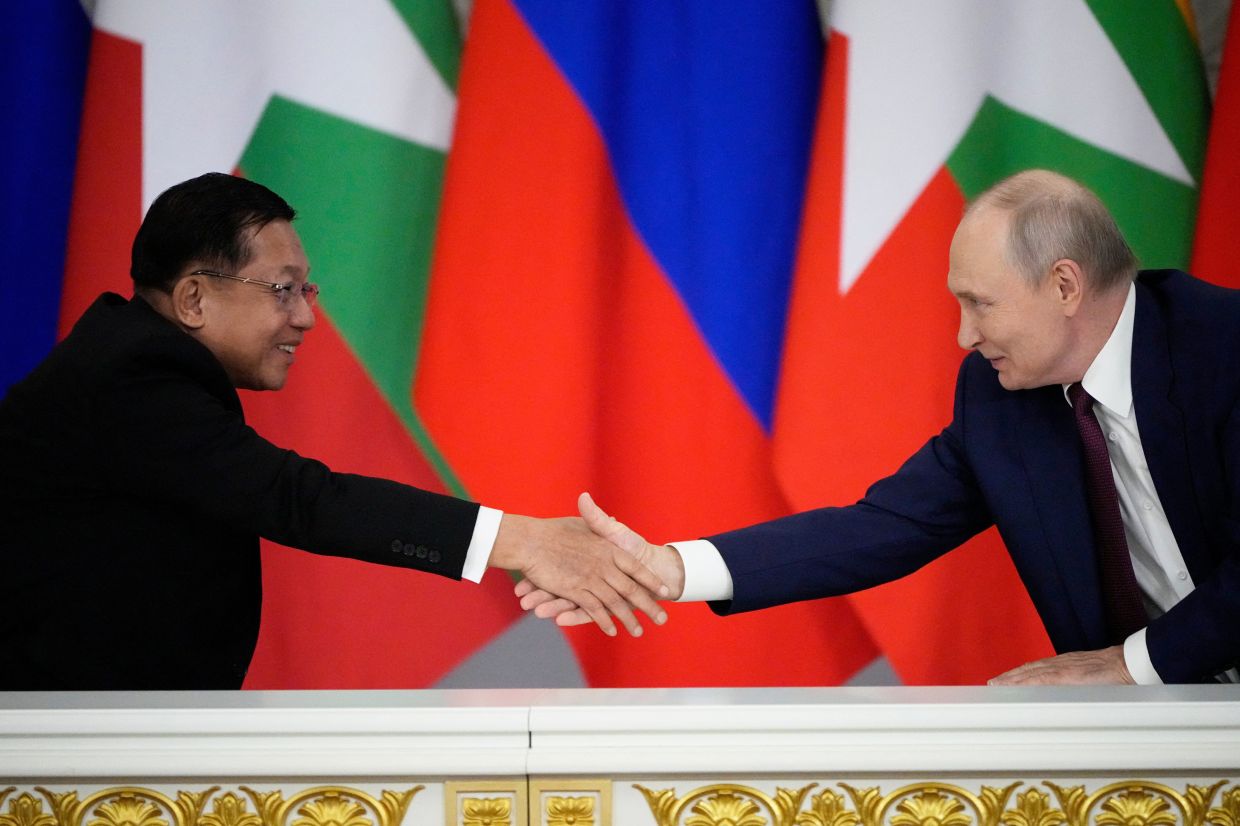 Putin courts Myanmar's military leader with investment pledges and defence ties