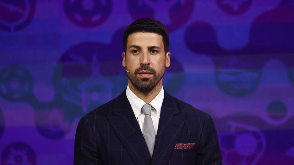 Two Flags, One Heart: Khedira Embraces Brothers Divided at World Cup