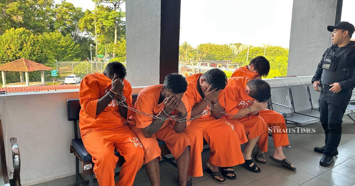 Four men charged over death of businessman whose body discovered in Johor river