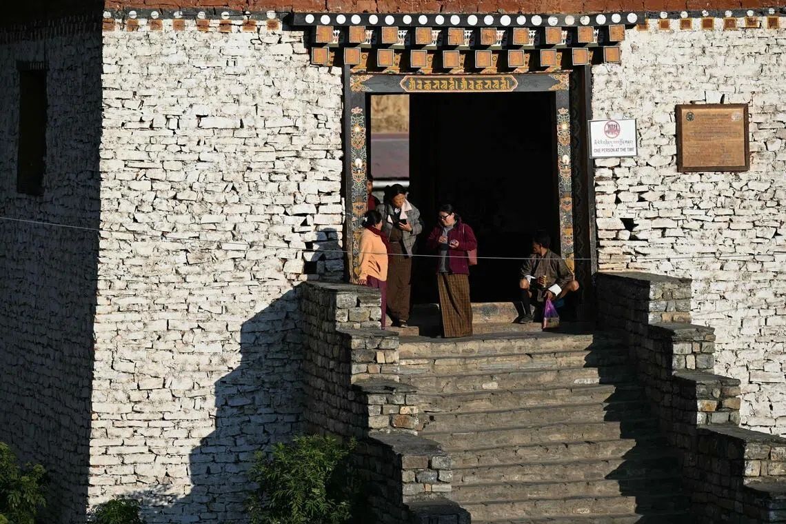 Bhutan launches cash incentives to reverse population decline as young people flee