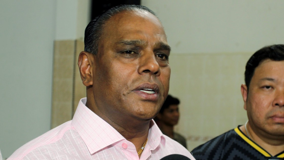 Supporters Rally in Black as Ex-HR Minister Saravanan Faces Corruption Charges