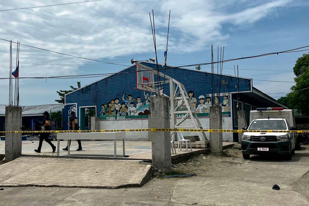Two teenage students arrested after shooting rampage kills three at Philippine high school
