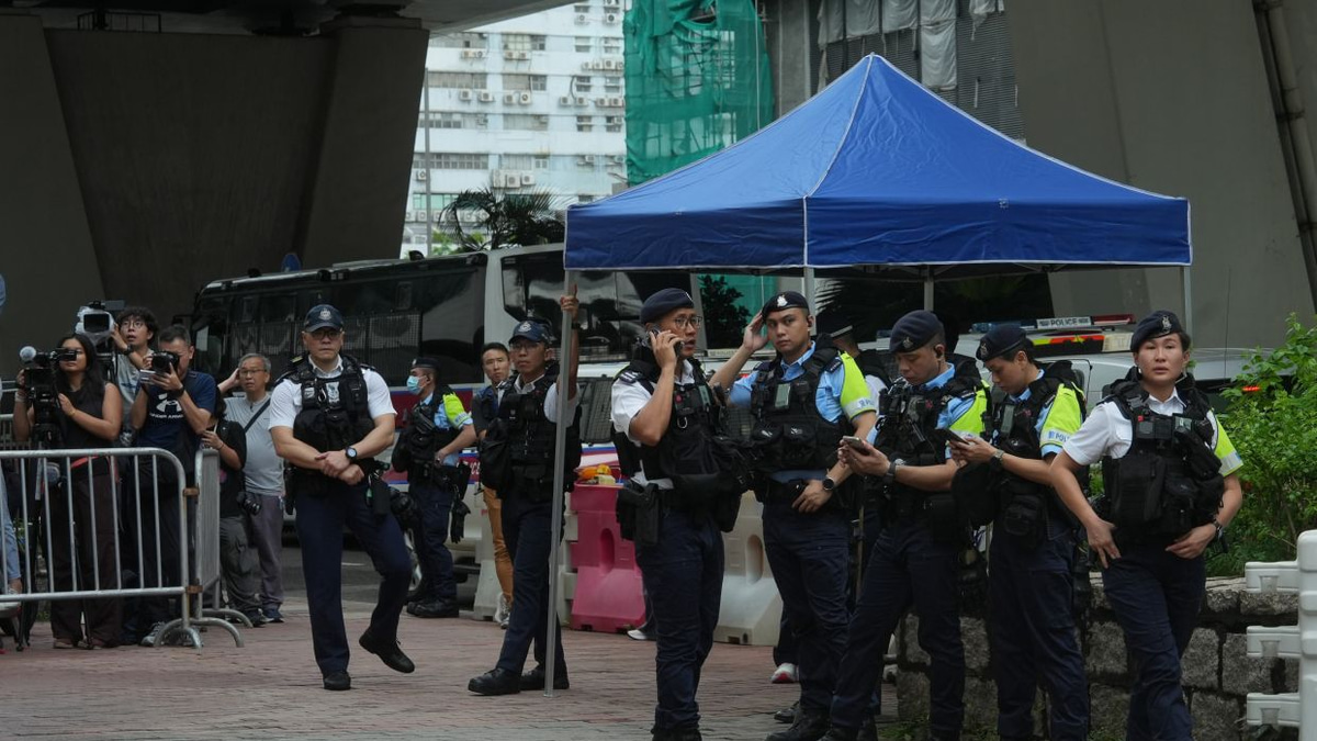 Hong Kong woman detained over T-shirt message as courts tighten sedition rules