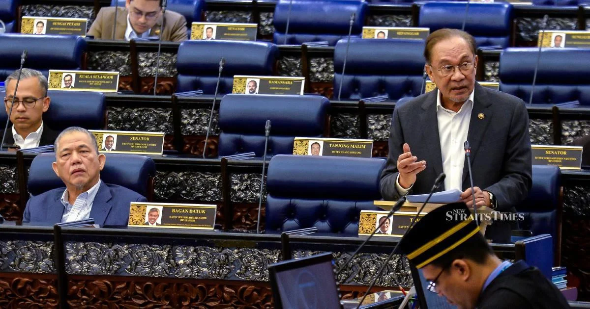 E-wallet firms face mandatory compensation rules for fraud failures, Anwar says