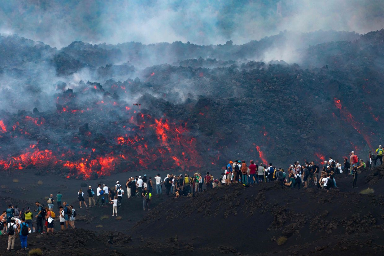 Mount Etna's spectacular eruption draws throngs of tourists despite safety concerns