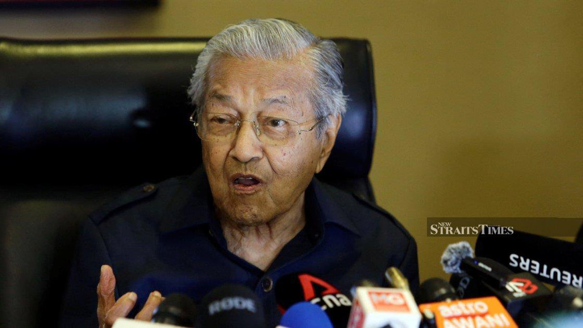 Dr Mahathir's RM150 Million Defamation Case Against Anwar Ibrahim Paused Pending Health Update