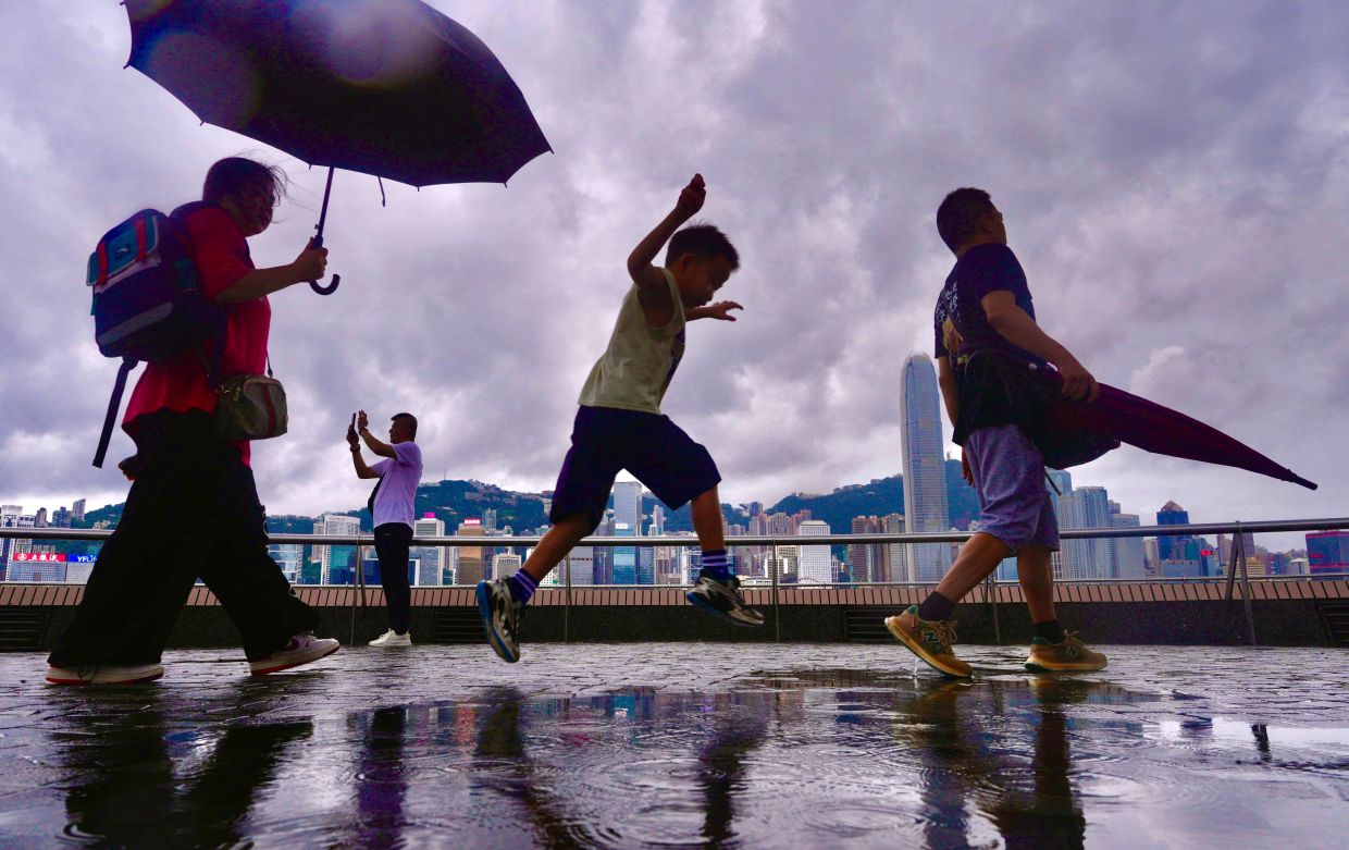 Hong Kong breaks century-old heat record before rain brings reprieve