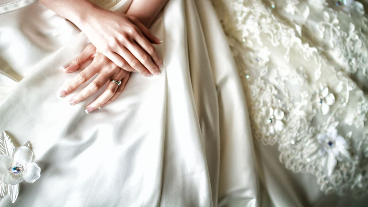 The Emotional Weight of Letting Go: Why Wedding Dresses Hold Such Powerful Sway Over Us