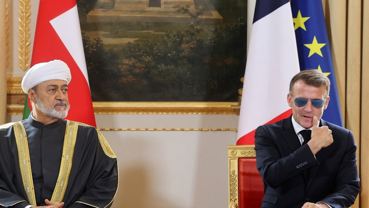 Macron's Aviators Return: French President Dons Sunglasses for Oman Sultan Meeting