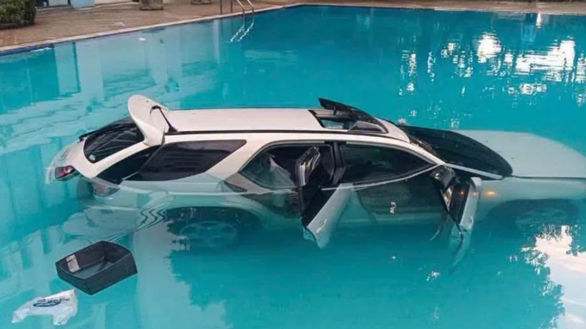 Thailand condo rent dispute escalates as son drives SUV into university pool
