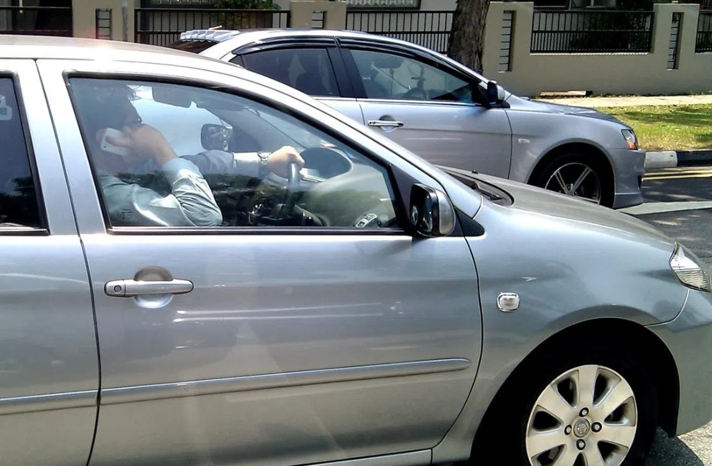 Singapore tightens road laws: phone-holding ban and harsher penalties for dangerous driving
