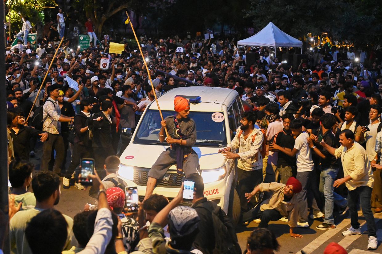 Modi Pledges Swift Justice for Exam Fraud as Student Protests Rock India