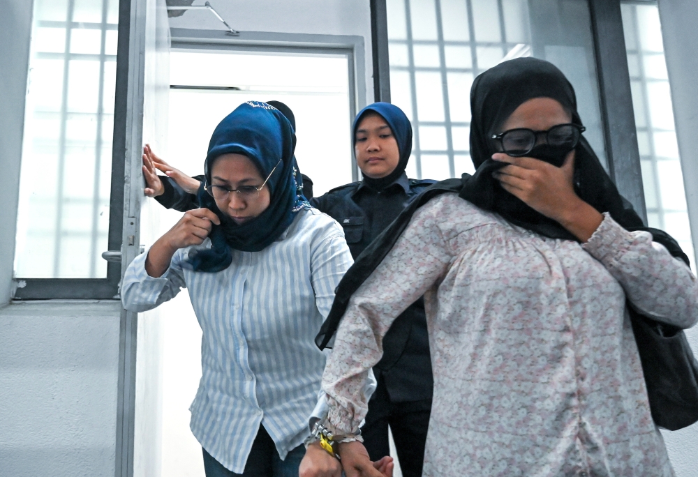 Two Women Charged in Perak Tax Scam That Defrauded Retiree of RM120,000