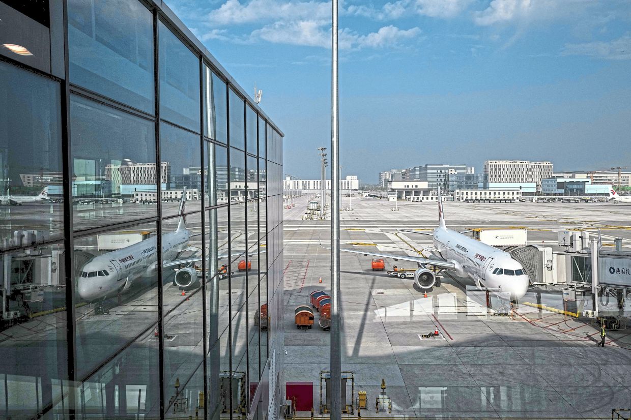 China's Big Three Airlines Lose Billions as Fuel Costs and Typhoons Hammer Earnings