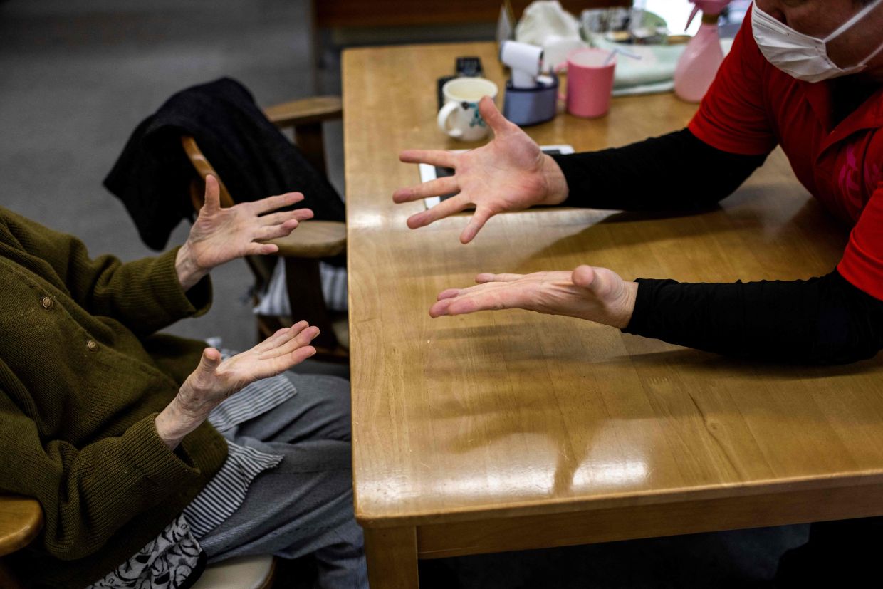 Japanese Doctor-Author's Provocative Novel Sparks Debate on Elderly Care Crisis
